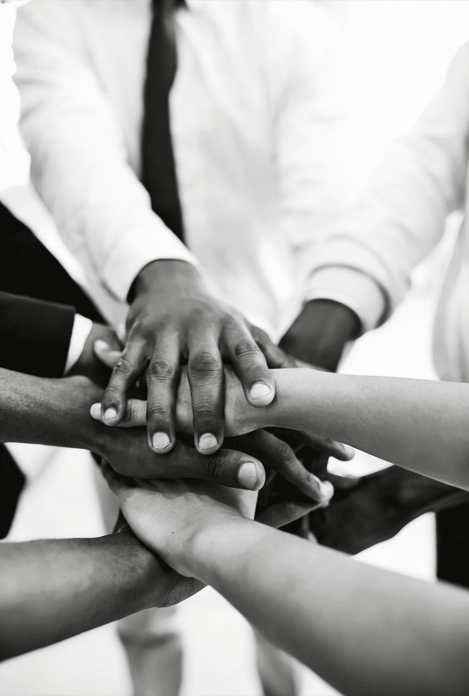Team hands together representing trust and security